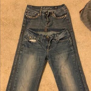 pair of la idol jeans and cowgirl up jeans